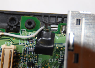 Insulate touch screen connector with electrical tape