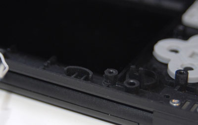 Trim plastic crescent so it is flush with edge of case