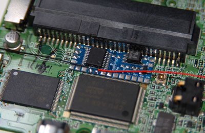 First, solder wires to the power supply pads